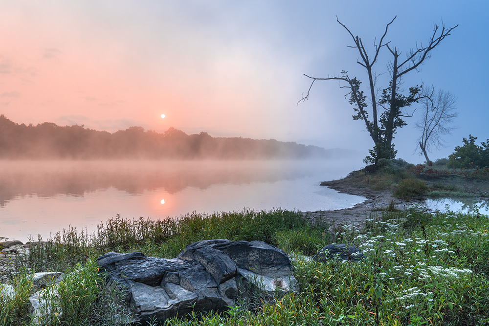 A big, lazy part of me is still looking forward to the moment when I create a photo masterpiece in my backyard. This was a close call, though. It took me a 7-minute drive from my house to enjoy this beautiful sunrise fog over the Potomac River. I even managed not to miss my morning coffee.