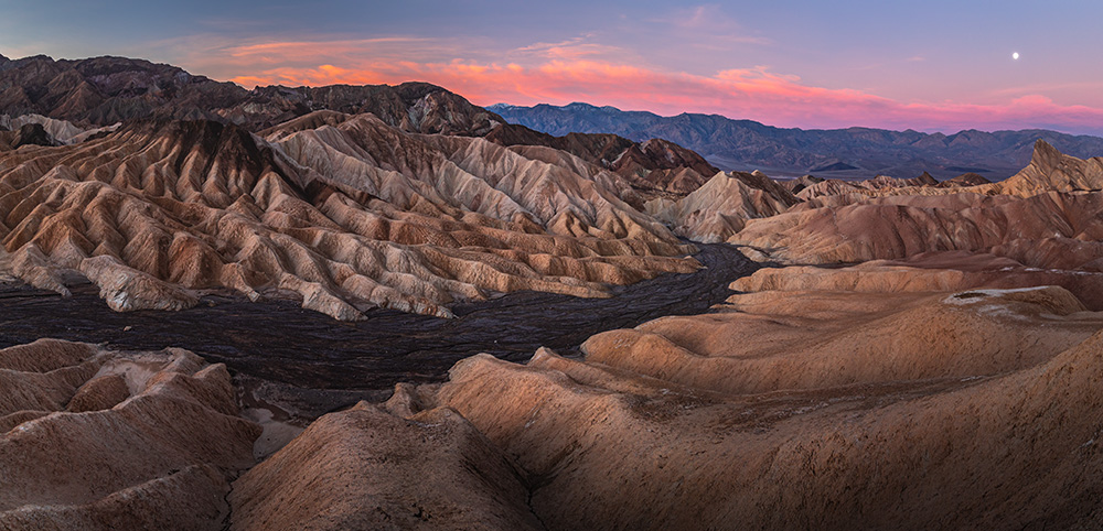 Warm pre-sunrise colors gave an extra reddish hue to the already colorful badlands of Death Valley.