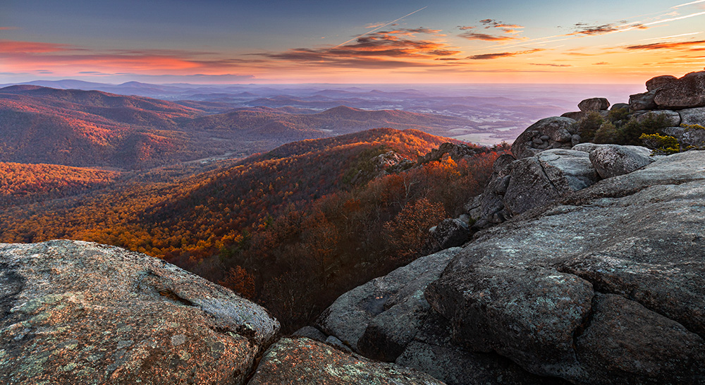 The Old Rag hike being one of the most popular in the Mid-Atlantic and attracting more than a thousand hikers on a good day can easily get lines longer than Georgetown Cupcake due to some narrow and relatively technical passages in its rock-scramble section and people not quite prepared for that. The best way to beat the crowd would be to hike the mountain at night. About an hour of romantic forest trail with steady incline, another hour for rock scrambling and one could be rewarded with a gorgeous sunrise over Virginia’s Piedmont. You might even make it to the summit faster if you are lucky enough to spot a black bear in the pitch-darkness.