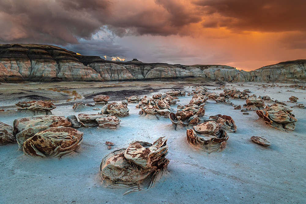 Do you know the best part of an approaching storm in the badlands? Definitely not the chance for incredible light for landscape photography. It’s the fact that sometimes these storms actually bring falling water—which immediately turns the clay-like soil into a slippery mess. After only two previous experiences skating in my life, this was my third. A two-mile hike on a skating rink back to the parking lot.