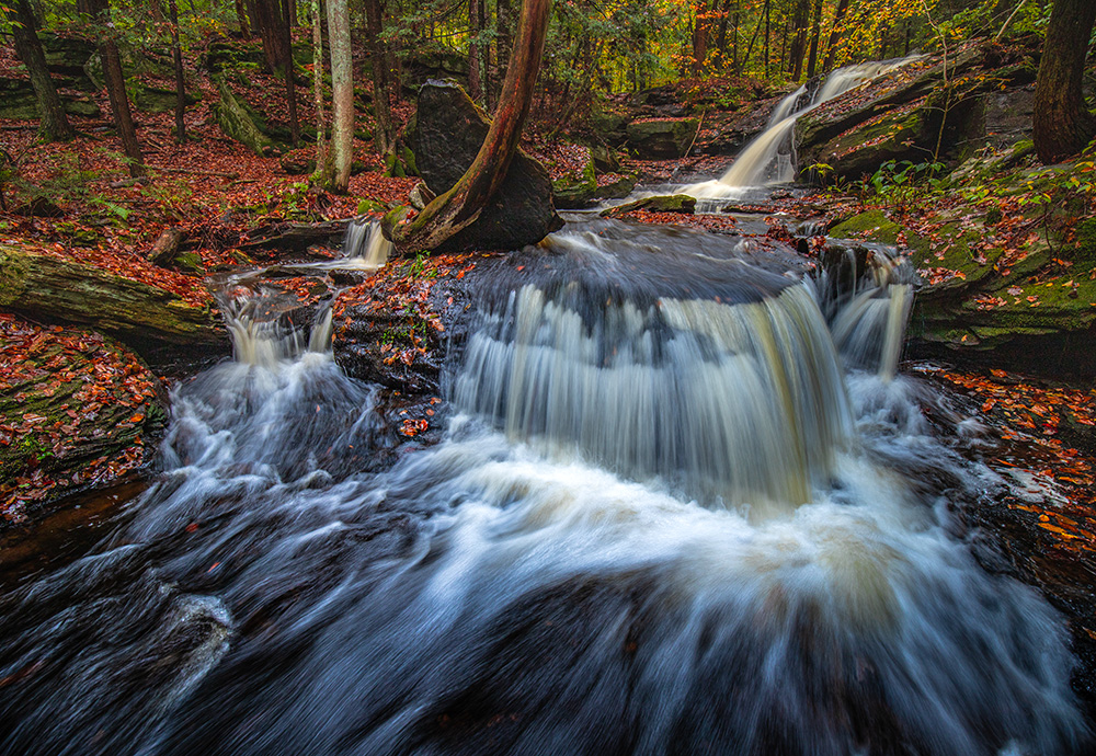 Although this area in Pennsylvania is more famous for its Ricketts Glen State Park, many other parks and game lands nearby hide dozens of beautiful waterfalls and cascades.