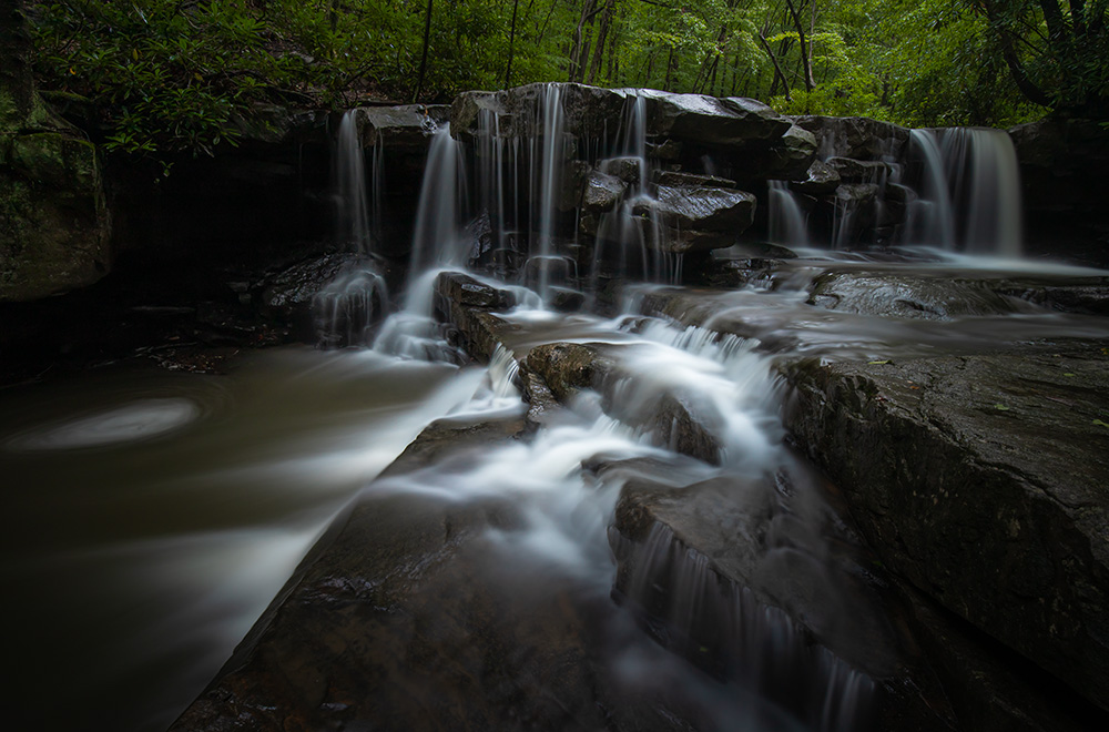 After 24 hours of non-stop rain, it finally stop, bringing subtle glow to the air and swelling Jonathan Run in Ohiopyle State Park.